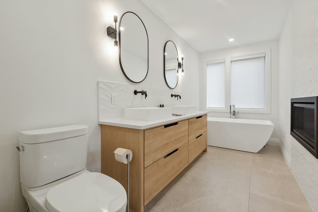 white ceramic sink with stainless steel faucet — Photo by Point3D Commercial Imaging Ltd. on Unsplash