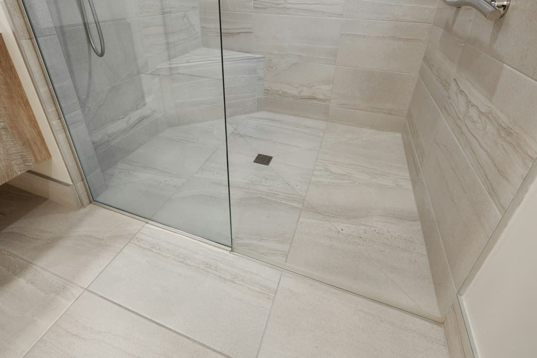 a white tiled floor — Photo by Point3D Commercial Imaging Ltd. on Unsplash