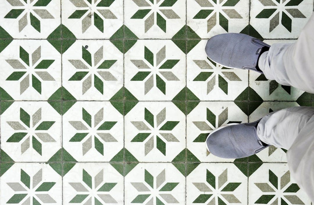green and white tile flooring — Photo by Alex Block on Unsplash