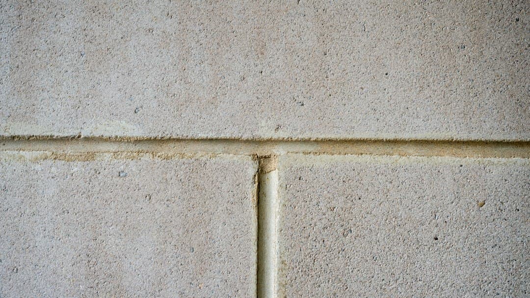 A close up of a white tiled wall — Photo by Jor Eg on Unsplash